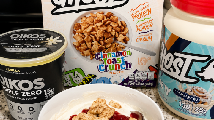 High protein cinnamon cereal bowl made with Ghost Cinnamon Toast Crunch protein cereal, Oikos Triple Zero yogurt, and Ghost Cinnabon protein powder Cinnabon Protein Bowl